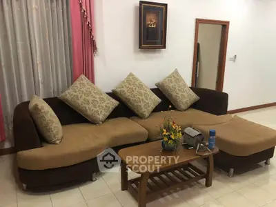 Cozy living room with stylish sectional sofa and elegant decor