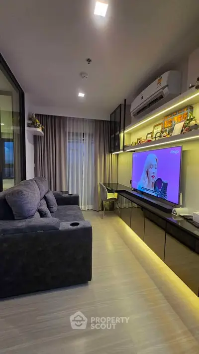 Modern living room with sleek furniture and ambient lighting