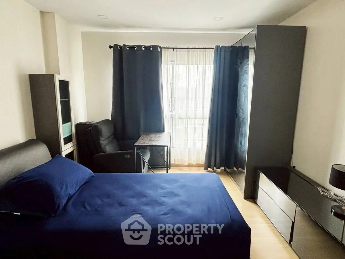 Cozy bedroom with modern furniture and natural light