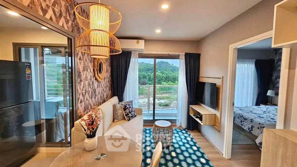 Modern living room with stylish decor and balcony view in a cozy apartment.