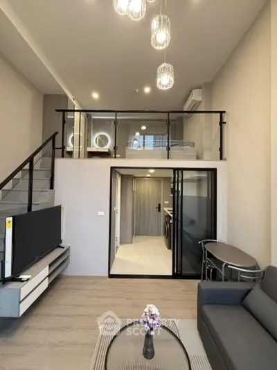 Modern loft-style living room with high ceiling and elegant decor