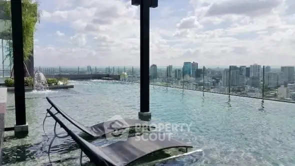 Luxurious rooftop infinity pool with stunning city skyline view