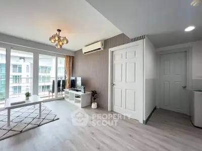 Modern living room with balcony view in stylish apartment