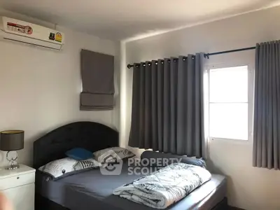 Cozy bedroom with modern decor and natural light