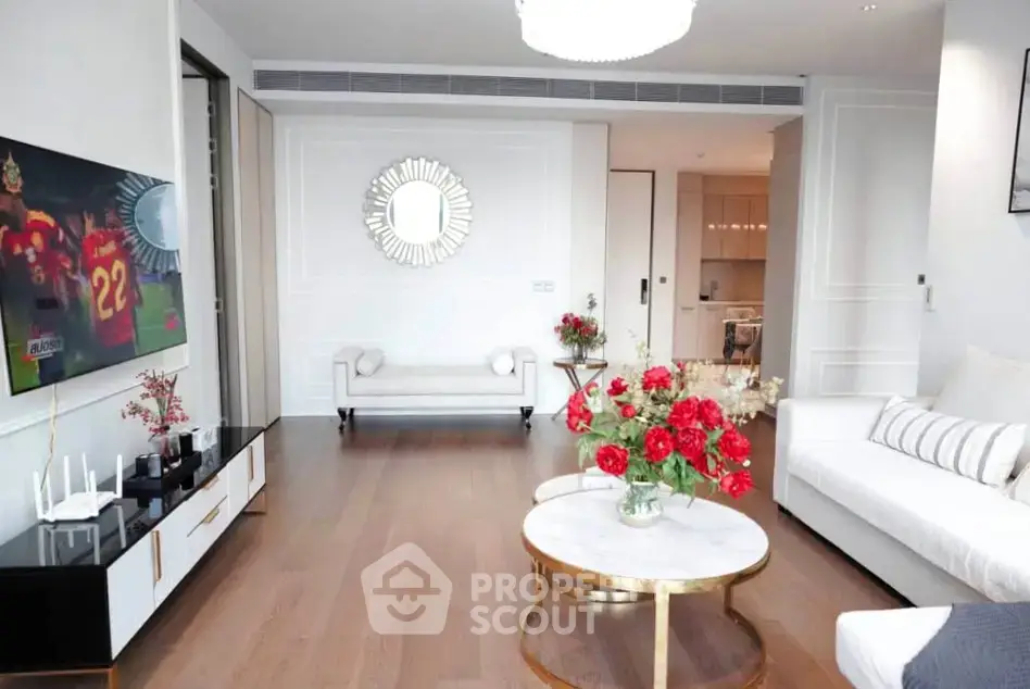 Luxurious living room with elegant decor and modern furnishings in a high-end apartment.