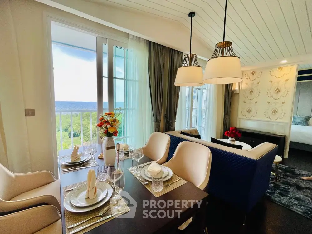 Luxurious dining area with ocean view and elegant decor in modern apartment