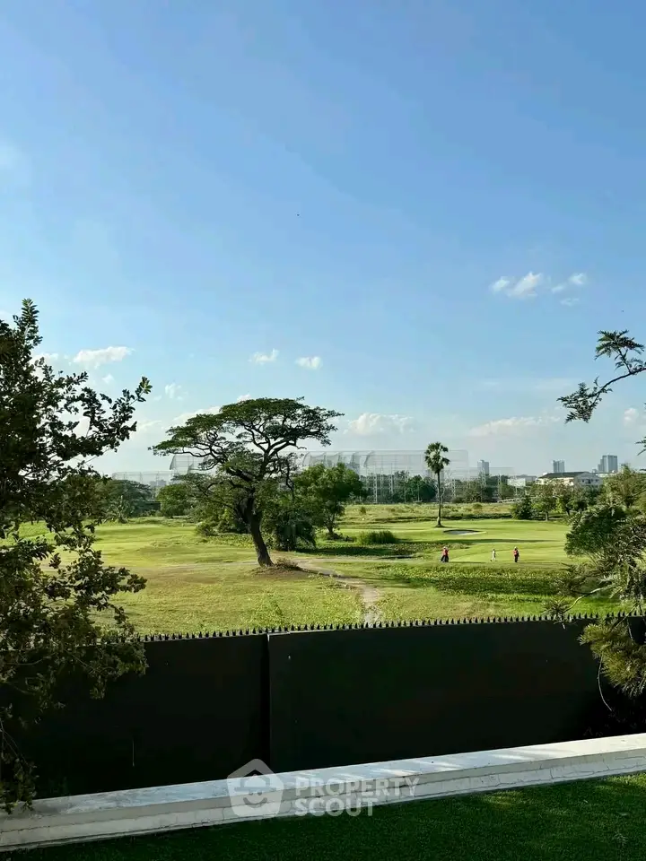 Stunning golf course view from a luxurious property, perfect for nature lovers and golf enthusiasts.