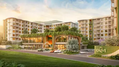 Luxurious modern apartment complex with lush greenery and elegant architecture at The Olive.