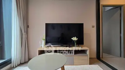 Modern living room with sleek TV setup and stylish decor