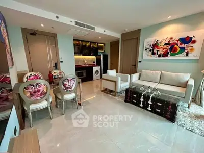 Modern living room with stylish decor and open kitchen layout