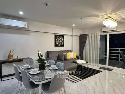 Modern living room with elegant decor and spacious dining area