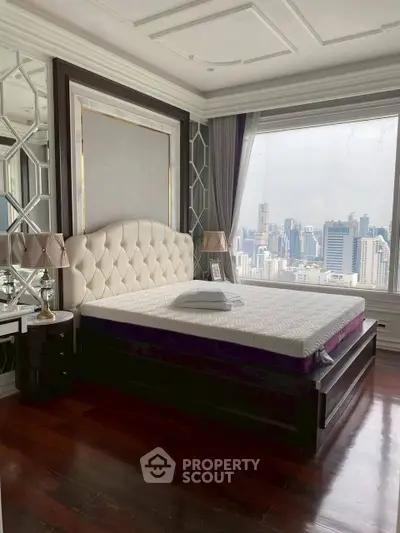 Luxurious bedroom with panoramic city view and elegant decor