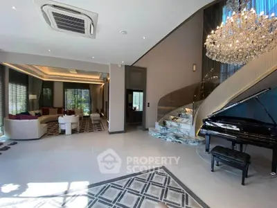 Luxurious living room with grand piano and elegant staircase in modern home