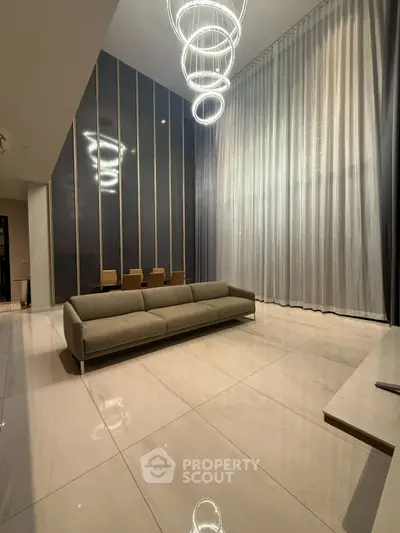 Luxurious modern living room with high ceilings and elegant lighting