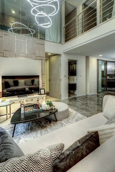 Luxurious modern living room with high ceilings and elegant decor