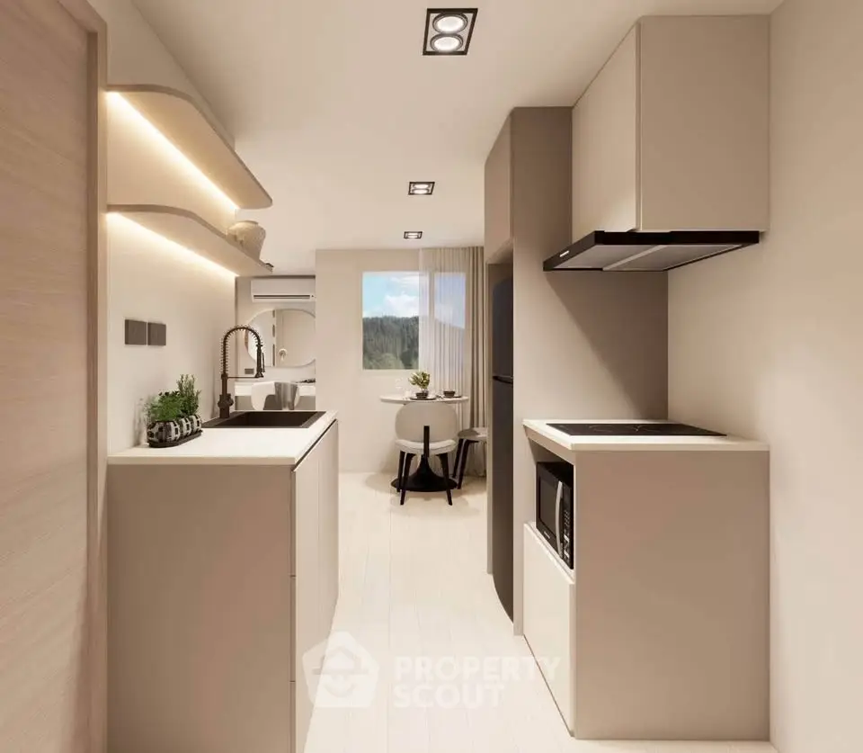 Modern kitchen with sleek design and open layout, featuring built-in appliances and natural light.