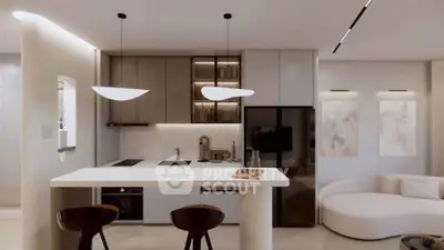 Modern kitchen with sleek design and open layout, featuring stylish lighting and contemporary furniture.