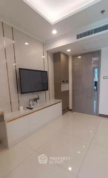 Modern living room with sleek TV setup and stylish decor