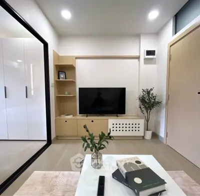 Modern living room with sleek TV setup and stylish decor