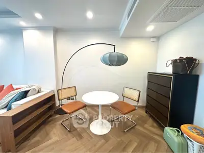 Chic modern living room with stylish furniture and unique lighting