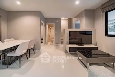 Modern living room with sleek furniture and open layout