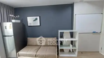 Modern living room with sleek sofa and stylish shelving unit