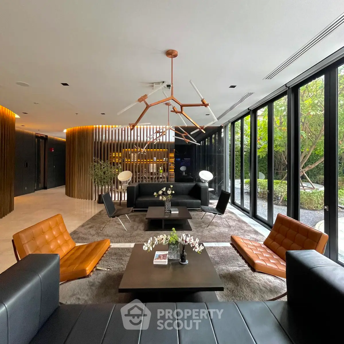 Luxurious modern living room with sleek furniture and garden view