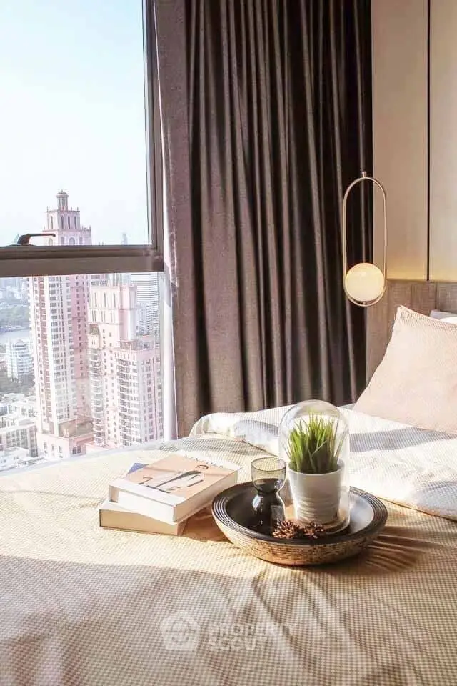 Luxurious bedroom with stunning city view and elegant decor