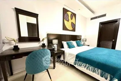 Luxurious bedroom with elegant decor and modern furnishings in a stylish apartment.