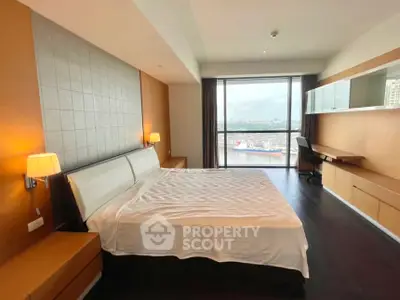 Spacious bedroom with modern design and stunning city view