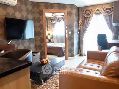 Luxurious living room with modern decor and cozy bedroom view