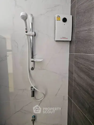 Modern bathroom shower with sleek design and water heater