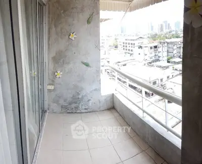 Spacious balcony with city view in modern apartment