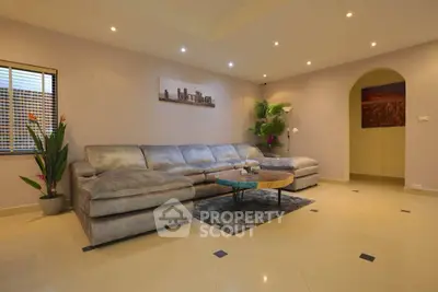 Spacious living room with modern decor and cozy sectional sofa