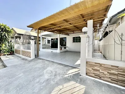 Spacious modern home with covered carport and stylish exterior design