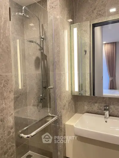 Luxurious modern bathroom with elegant marble tiles and sleek fixtures