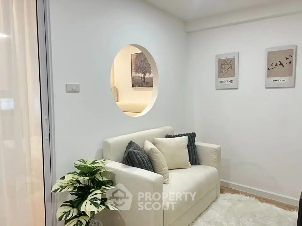 Cozy living room with modern decor and plush seating