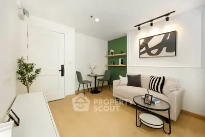 Modern living room with stylish decor and cozy seating area, perfect for relaxation and entertaining.