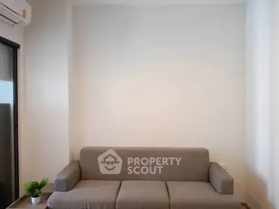 Modern living room with minimalist sofa and air conditioning