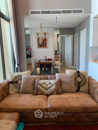 Luxurious living room with elegant decor and plush leather sofa in modern apartment