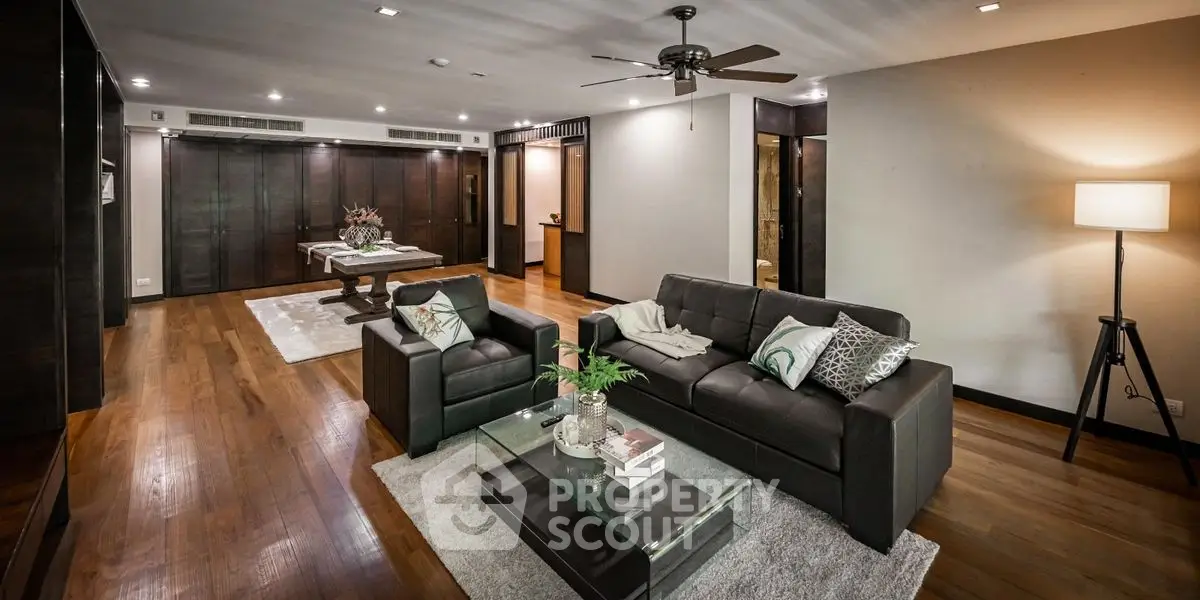 Luxurious modern living room with elegant decor and hardwood floors