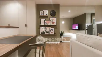 Modern living room with stylish decor and wooden flooring