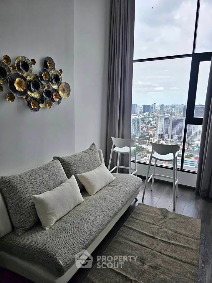 Modern living room with stunning city view and stylish decor