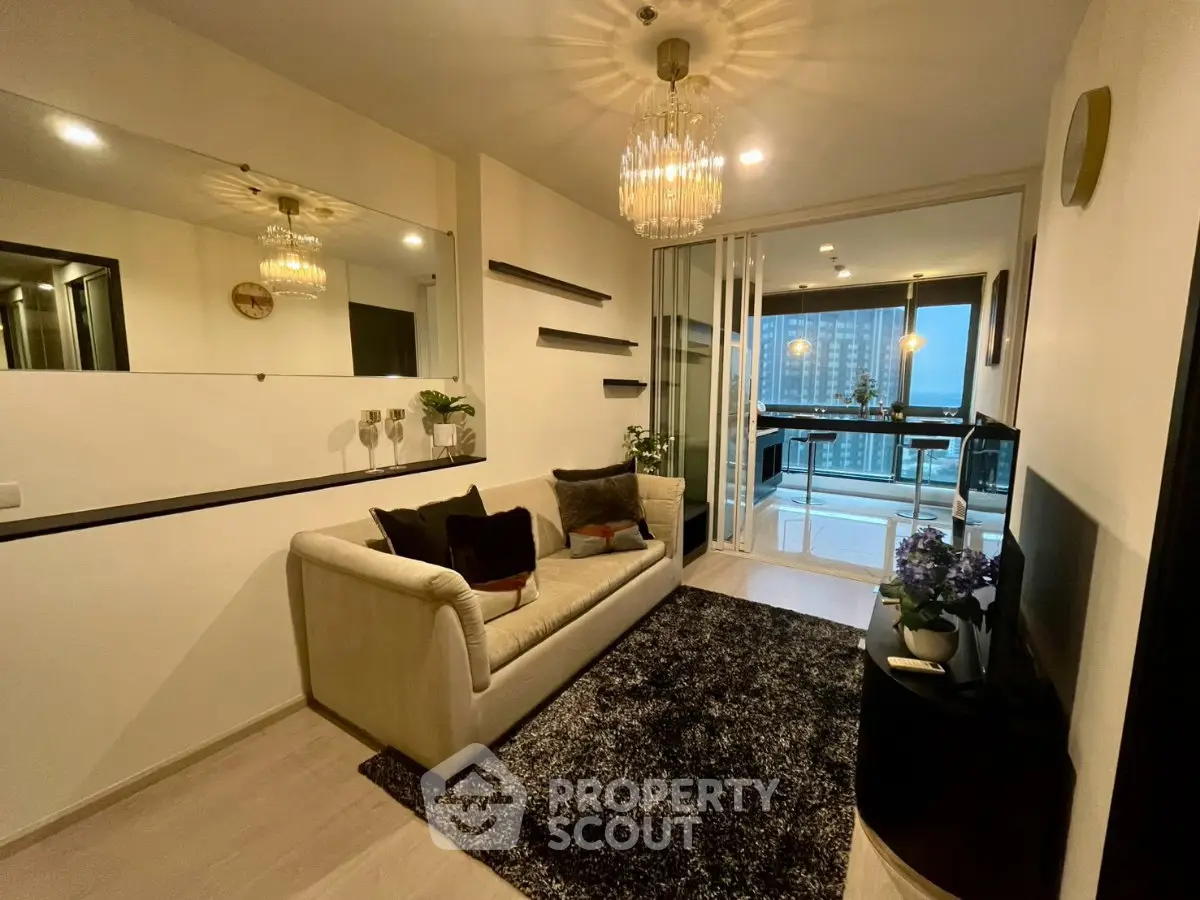Stylish living room with elegant decor and city view balcony