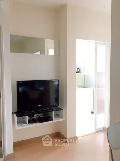 Modern living room with wall-mounted TV and sleek design