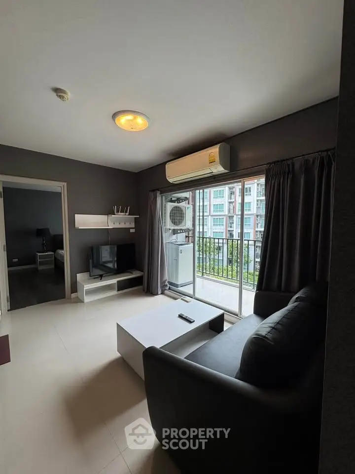 Modern living room with balcony view in stylish apartment