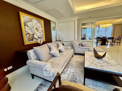 Luxurious living room with elegant decor and plush seating in a modern apartment