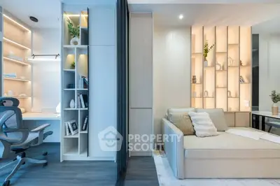 Modern living room with stylish shelving and cozy seating area, perfect for relaxation and productivity.