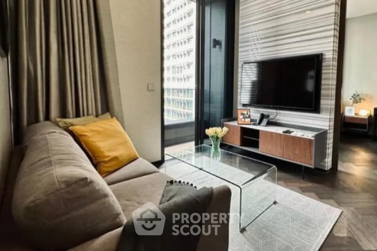 Modern living room with stylish decor and large window view