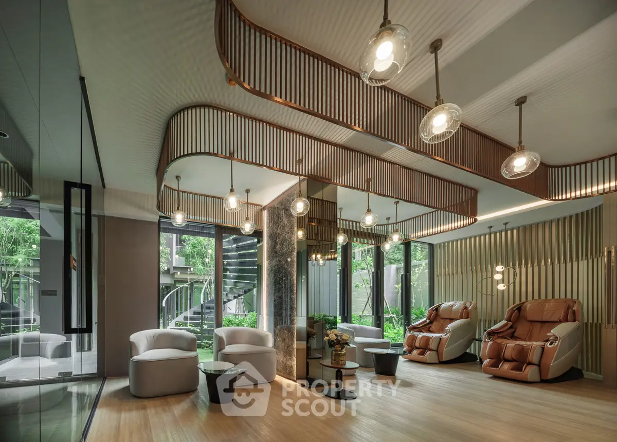 Luxurious modern living room with elegant lighting and plush seating, featuring floor-to-ceiling windows with garden view.